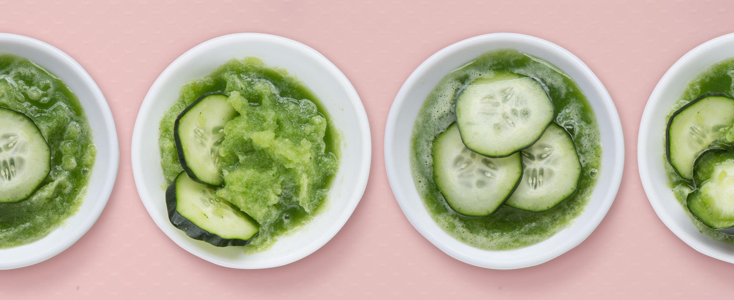 An overhead shot of ZOKU's Healthy Frozen Green Smoothies garnished with cucumber