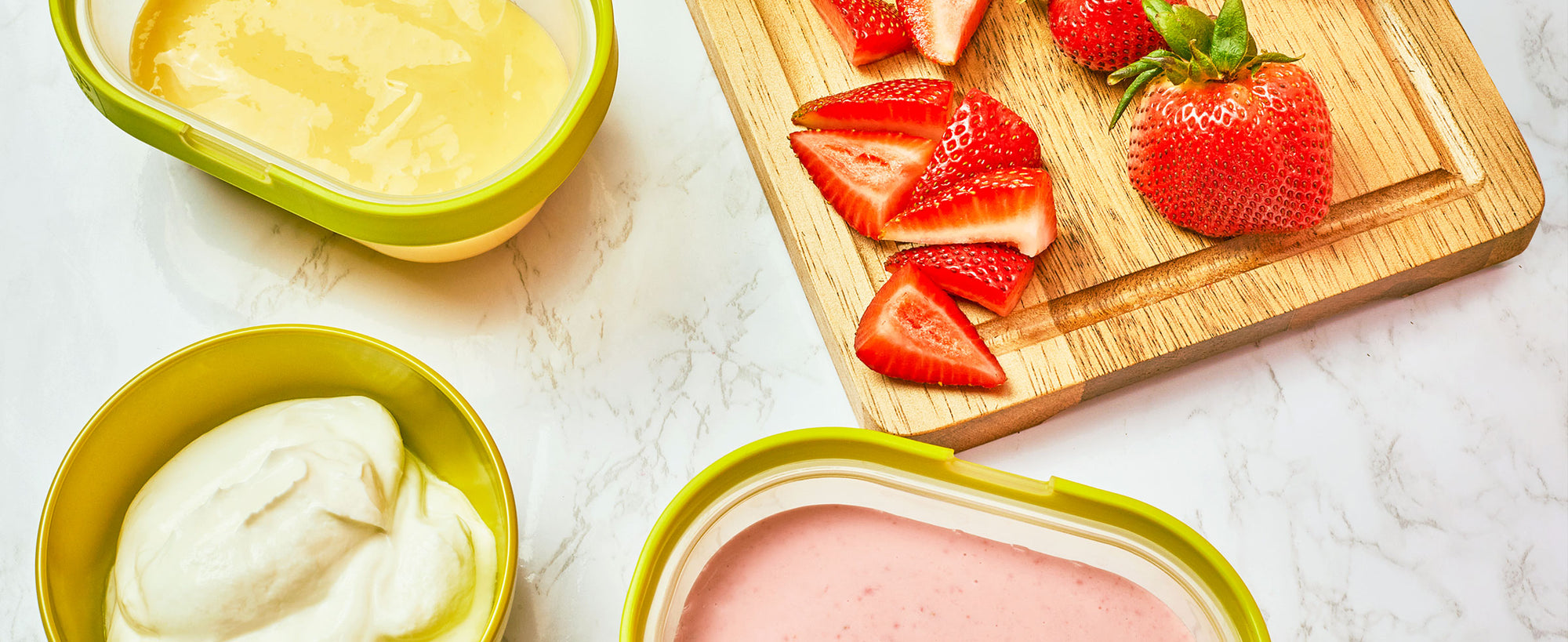 An image of various homemade baby food recipes in ZOKU’s Neat Stack food containers and a Neat Stack Food Jar.