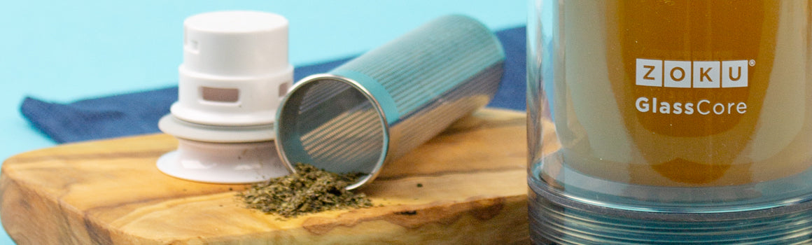 An up close shot of the ZOKU Glass Core Bottle and Tea Infuser.
